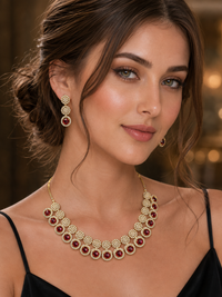 Elara — Ruby Sunburst Necklace & Earring Set